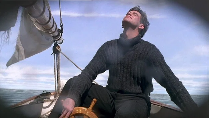 truman burbank no barco enfrentando a tempestade em o show de truman final explicado